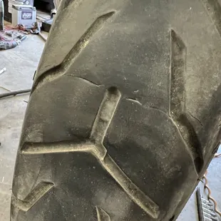 Manufacturing defective cracks in HD Dunlop tire.