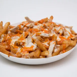 Our TBIRD FRIES!  French Fries with grilled chicken chunks, ranch dressing, wing sauce, baked with mozzarella cheese on top!