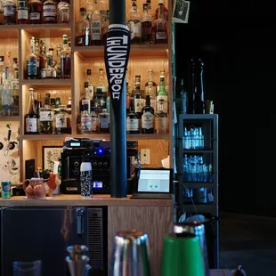 a bar with a variety of liquors