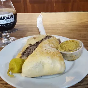 Thunder Zone Calzone   Alfredo Sauce, Pepper jack Cheese, Roasted Chicken, Bacon and Jalapenos