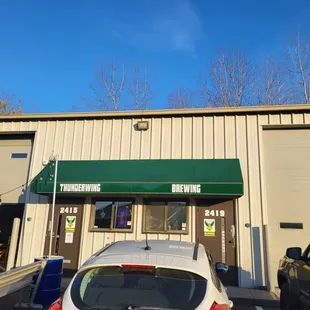 a car parked in front of a building