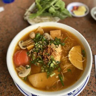 vegetarian Crab and tomato noodle soup. The crab cake in the soup is EPIC.