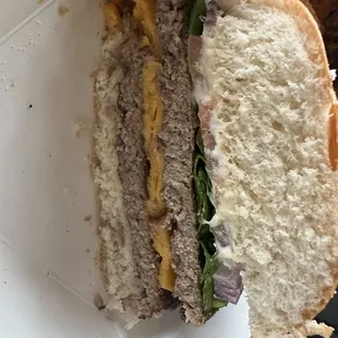 Stale bun, overcooked patties and cheese not melted!