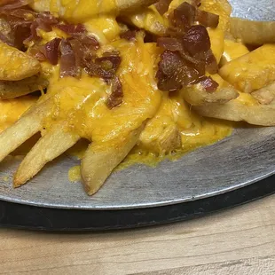 Bacon cheese fries $10!