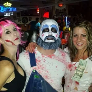 three people dressed up as zombies