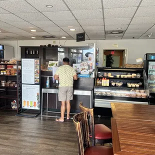 a woman standing at the counter