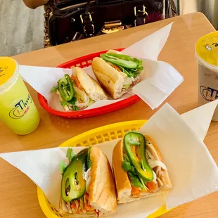 a sandwich and a drink on a table