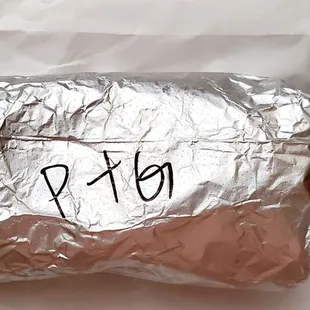 Getting another Chicken Burrito ($10.00)! This time I got it with Guacamole ($1.00 extra).