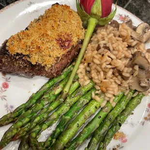 Orange thyme crusted filet mignon, white wine risotto with cremini mushrooms, and citrus roasted asparagus