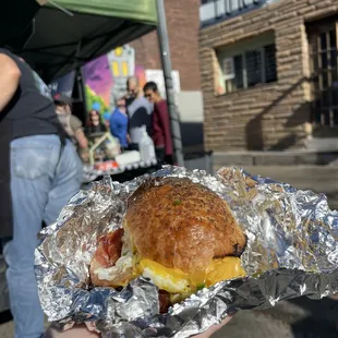 Cheddar and broccolini sandwich with bacon.