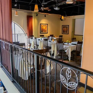 a restaurant with tables and chairs
