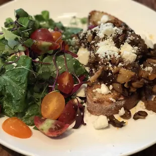 Mushroom toast with wild mushroom, avocado and ricotta cheese. Note the avocado is missing!