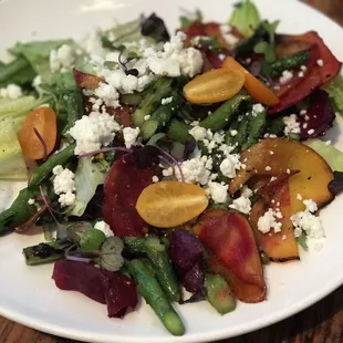 Asparagus with roasted beets, avocado, honey herbed goat cheese and pistachio vinaigrette.  Note the avocado is missing!