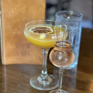 two glasses of wine on a table