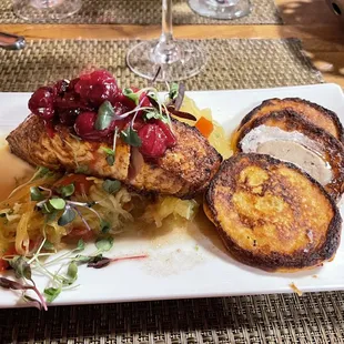 Smoked salmon  topped with cranberries and a side sweet potato   fritters.  From the textures to the flavors - absolutely delicious!