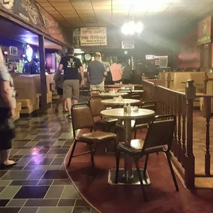 a restaurant with tables and chairs
