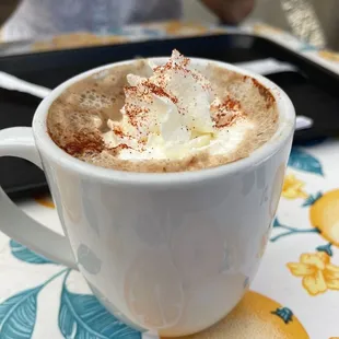 Mexican mocha cafe with red chili flakes.