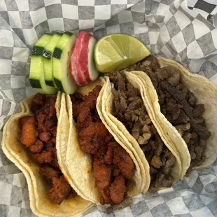 Al pastor and asada tacos (comes with salsas, cilantro, onions, but I photographed naked)