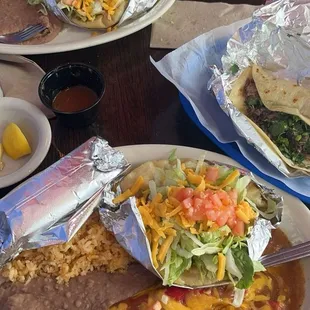 laredo plate , barbacoa taco with cilantro , puffy taco plate
