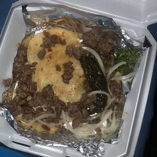 Not even made. Tortillas are stacked on top of each other and meat just thrown on the side