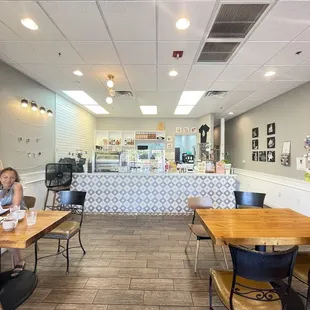 a woman sitting at a table