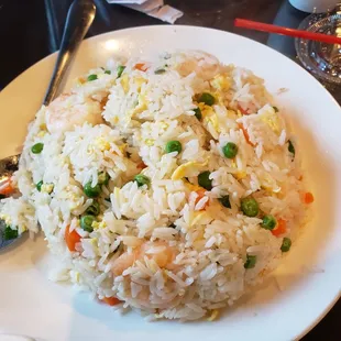 a plate of rice and vegetables