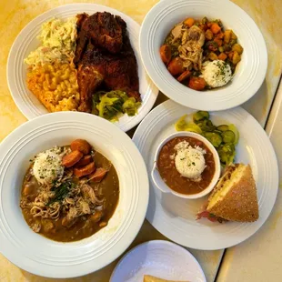 Cajun Spiced Half Chicken, 7 Greens Gumbo w/ Chicken and Sausage, Muffuletta Sandwich, House-Filled Beignet, House Gumbo
