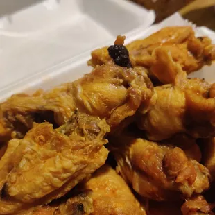 Somehow burnt and soggy chicken wing
