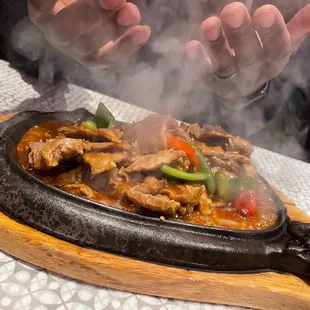 a person cooking a dish