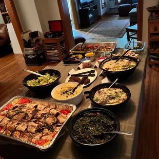 Catering- Arabic style beef Shwarma, baba ghanoush, rice, salad, falafel, hummus, assorted kabobs, pita, grapes leaves.