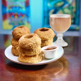 Onion Ring Stack and Big Easy vibes, ice-cold schooner beers.