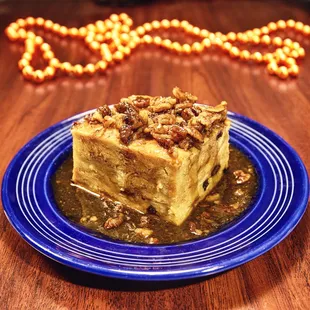 PRALINE BREAD PUDDING
Served warm, mixed with raisins &amp; topped with our homemade praline sauce.