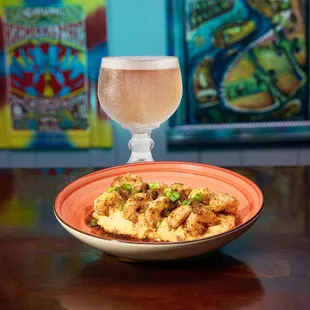 Shrimp and Grits -Big Easy vibes, ice-cold schooner beers.