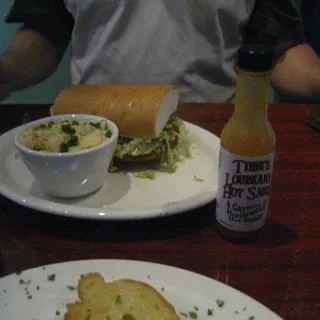 ANDOUILLE CHEDDAR GRITS