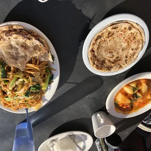 Chapati, fried noodles, potato and spinach