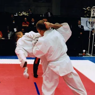 Sensei Ronny Guzman landing hook kick to back of competitor&apos;s head for Team Trials to Paris Open in France.