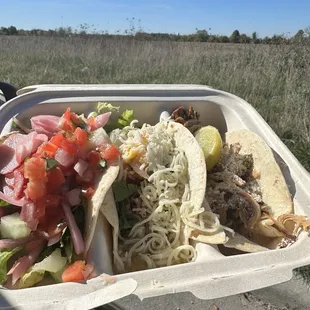 Left to right: Grilled chicken garden salad, notorious pig, OG