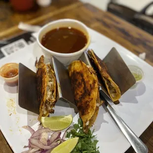 Quesabirria tacos with lamb consommé