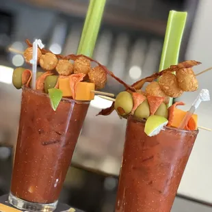 two glasses of bloody cocktails