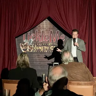 a man on stage speaking