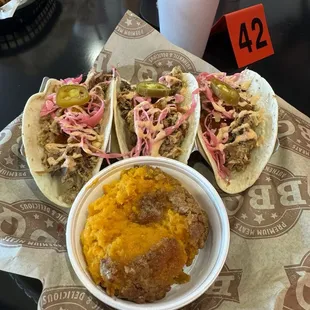 Street tacos, pork, pineapple salsa, pickled cabbage, jalapeño&apos;s