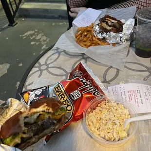 top: - Pearl Jam - sub black bean burger- fries  bottom: - Slaytar - - Grippos BBQ Chips -- Cole Slaw -