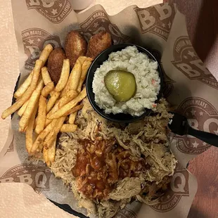 Barbecue, slaw, French fries, and Hush Puppies