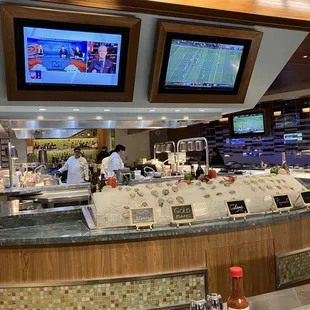 View when sitting at the bar - I see Kumamoto oysters!!