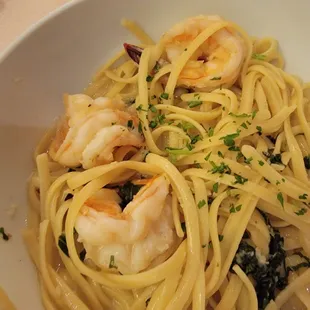 a bowl of pasta with shrimp