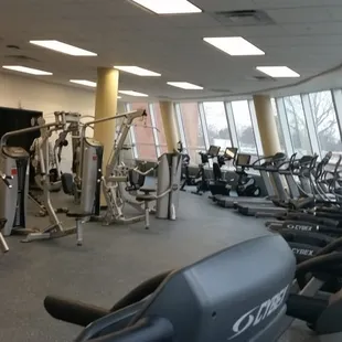 The work out area with treadmills, weights,  stair master, etc.