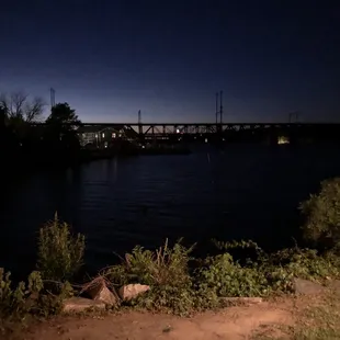 a view of a bridge at night