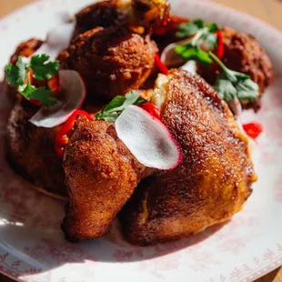 a plate of fried food on a table