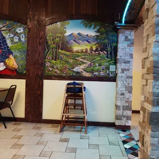 Beautiful hand painted murals on the wall in the restaurant area of La Princesca