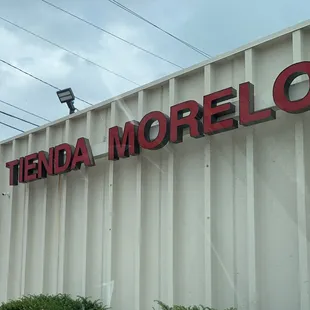 Outside. Name clearly posted. Good signage.